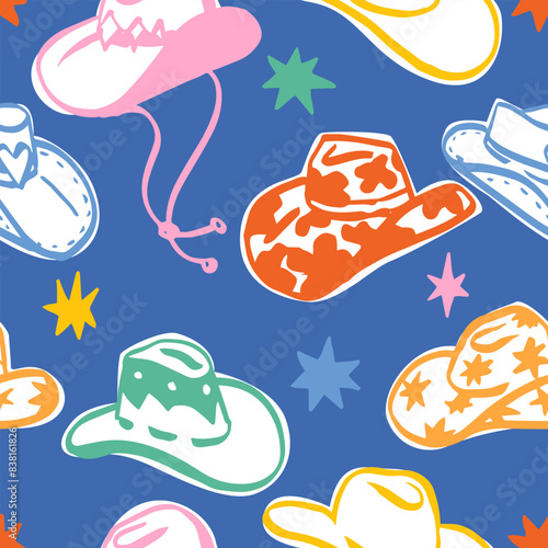 Seamless pattern with various hand drawn doodle ink brush trendy cowboy hats . Boho American western desert background.Vector funky illustration. 