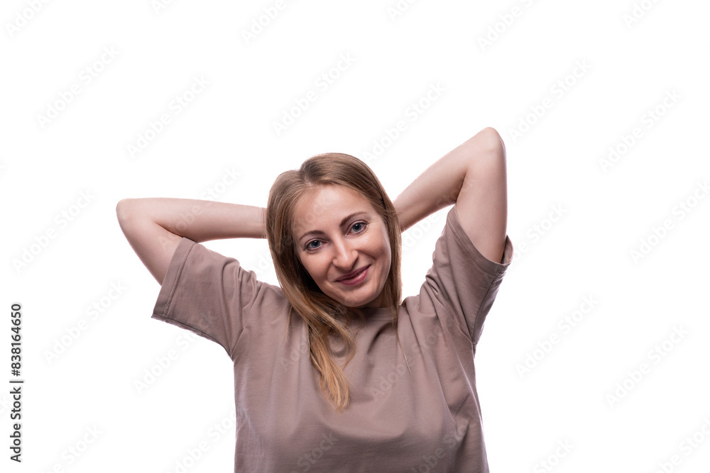 Cute European 40 years old woman with blond hair on white background Cute European 40 years old woman with blond hair on white background