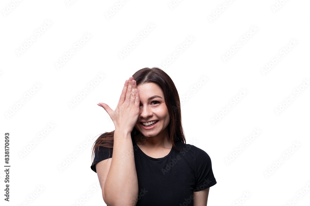 Young pretty european woman dressed in a black t-shirt smiling Young pretty european woman dressed in a black t-shirt smiling