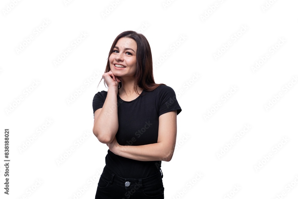 Portrait of a young brunette woman dressed in a black T-shirt on a clean background Portrait of a young brunette woman dressed in a black T-shirt on a clean background