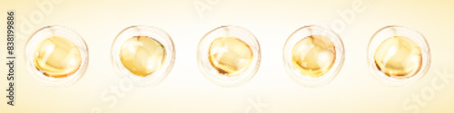 Transparent golden liquid bubbles. Golden yellow bubble oil or serum isolated on yellow background. Concept skin care cosmetics solution