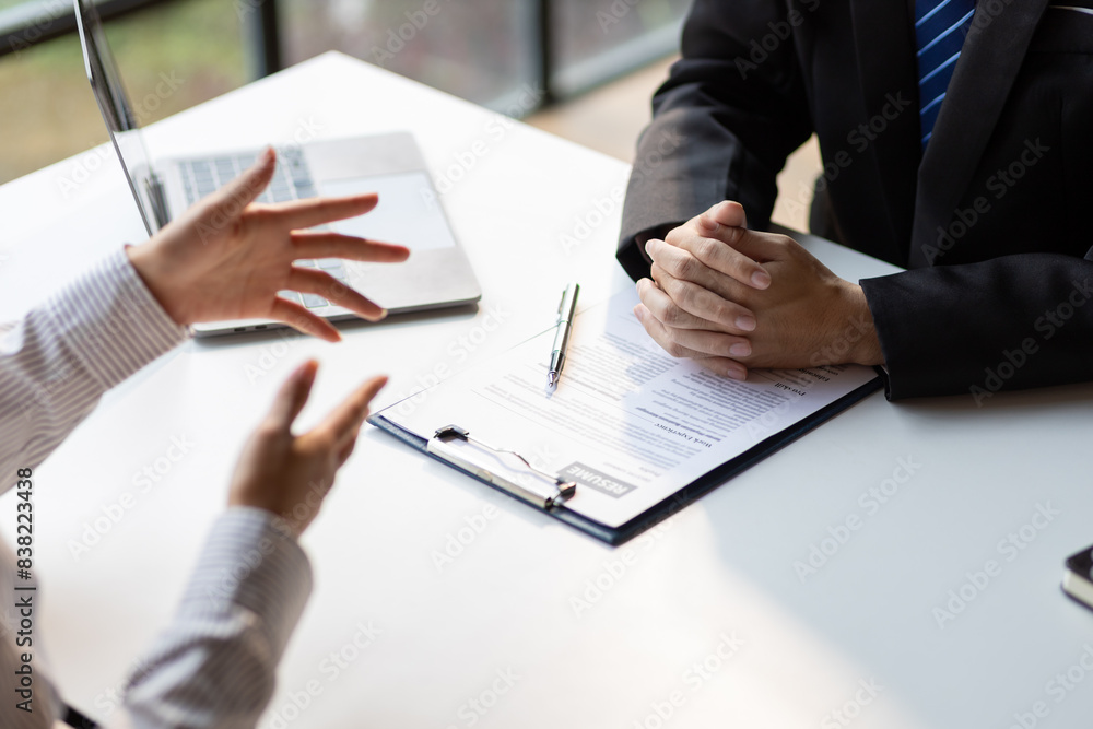 Job interview, The job applicant submits the application documents. Managers read resumes and interview new employees. Job interview, The job applicant submits the application documents. Managers read resumes and interview new employees.
