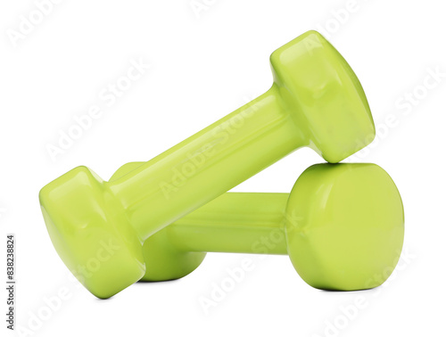 Light green dumbbells isolated on white. Sports equipment
