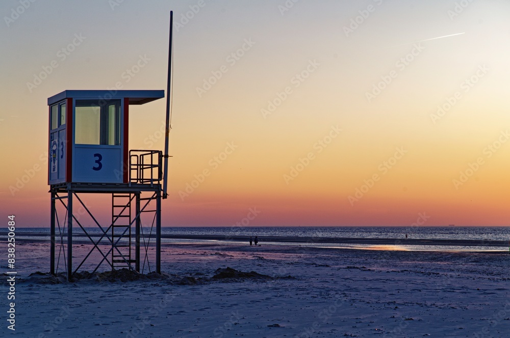 Lifeguard hut on a beach at sunset, Juist, Aurich, East Frisia, Lower Saxony, Germany Lifeguard hut on a beach at sunset, Juist, Aurich, East Frisia, Lower Saxony, Germany