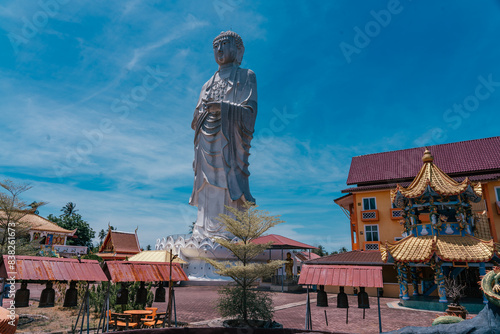 Wat Phothikyan Phutthaktham Thai White Buddha Statue in Kota Bharu, Malaysia photo