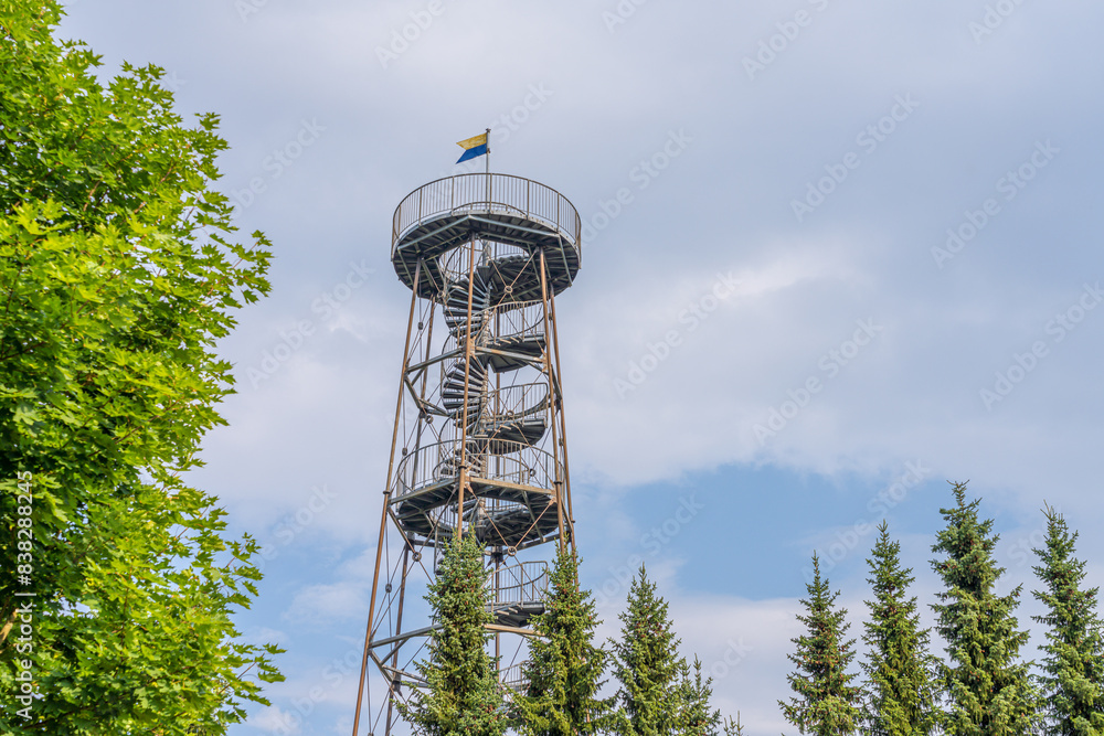 Aussichtsturm Dreibrüderhöhe Observation Tower with Flag Against Blue Sky