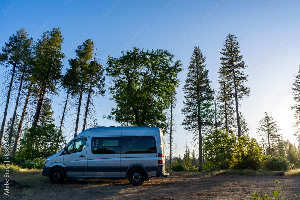 Camper van parked in the sierra mountains at sunrise. Camper van parked in the sierra mountains at sunrise.