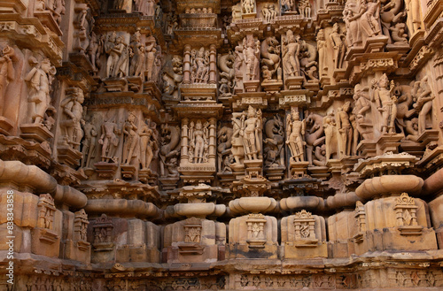 Ancient sculptures carved on the wall of Kandariya Mahadeva Temple in the Khajuraho temple complex  India