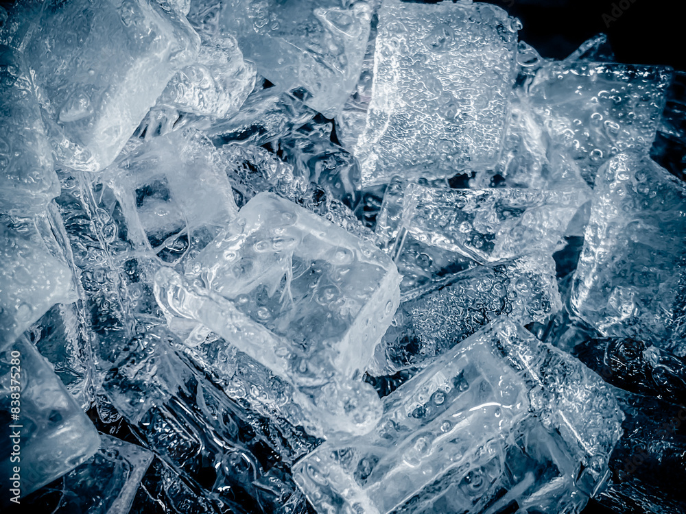 Obraz premium icecubes background,icecubes texture,icecubes wallpaper,ice helps to feel refreshed and cool water from the icecubes helps the water refresh your life and feel good.ice drinks for refreshment business