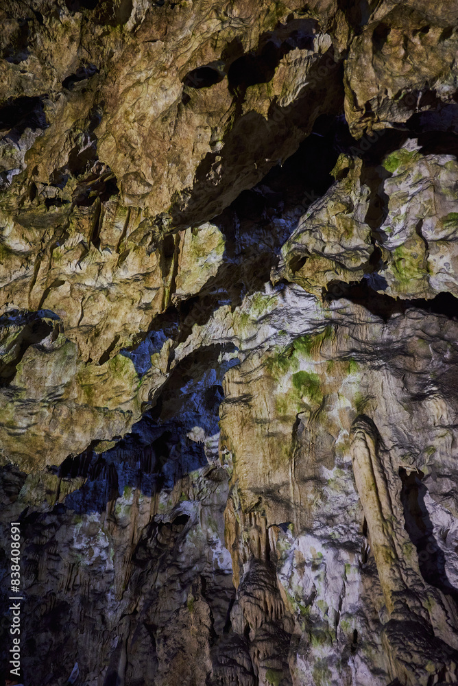 Rock formations and abstract texture on the walls in the Polovragi Cave with stalactites and stalagmites Rock formations and abstract texture on the walls in the Polovragi Cave with stalactites and stalagmites