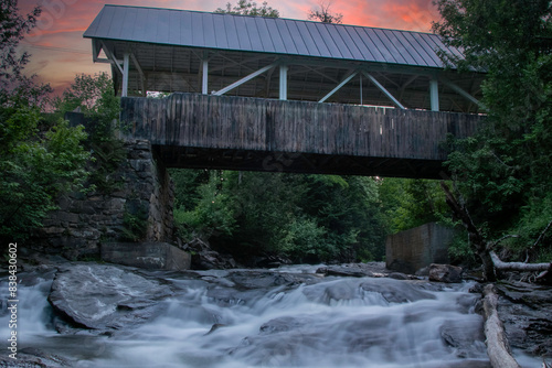 Greenbank Hollow covered bridge over Joe's Brook at sunset