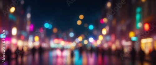 Abstract defocused background of colorful city lights at night Blurry backdrop. photo