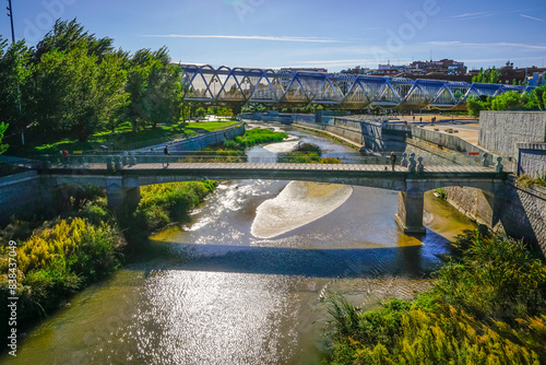 Cuadro en lienzo Arganzuela Bridge in Madrid, striking river bridge, with a helical structure and