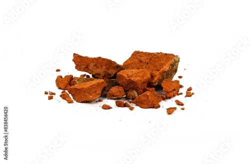 Shattered, broken bricks isolated on white background.