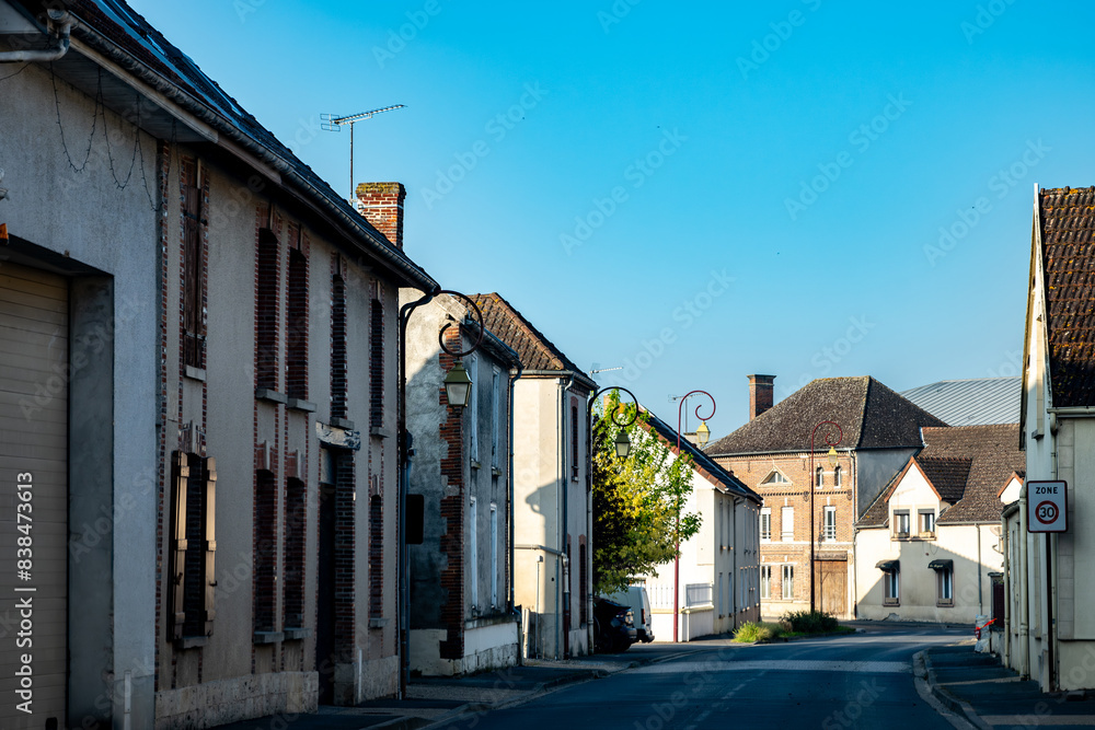Driving in Champagne wine making region in Champagne, France. Streets, houses, road signes and places of destinations in summer Driving in Champagne wine making region in Champagne, France. Streets, houses, road signes and places of destinations in summer
