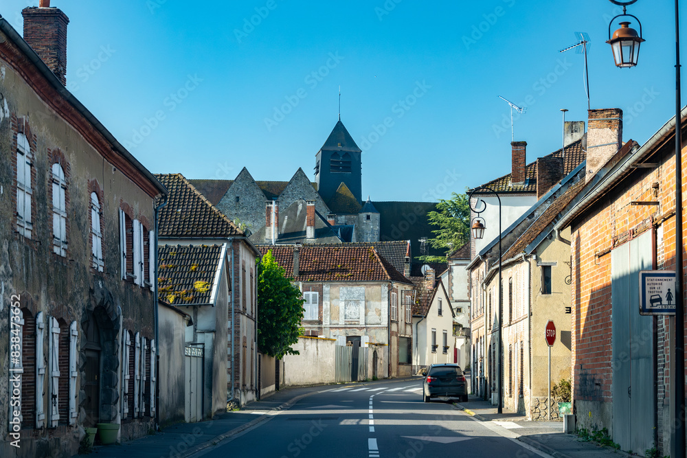 Obraz premium Driving in Champagne wine making region in Champagne, France. Streets, houses, road signes and places of destinations in summer