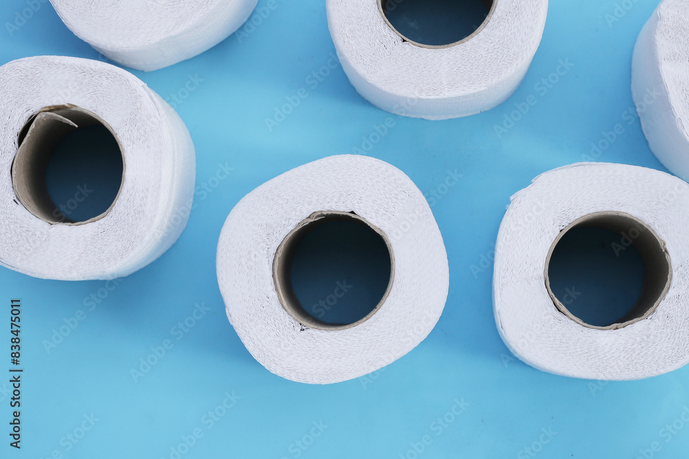 Toilet paper on blue background. Toilet paper on blue background.