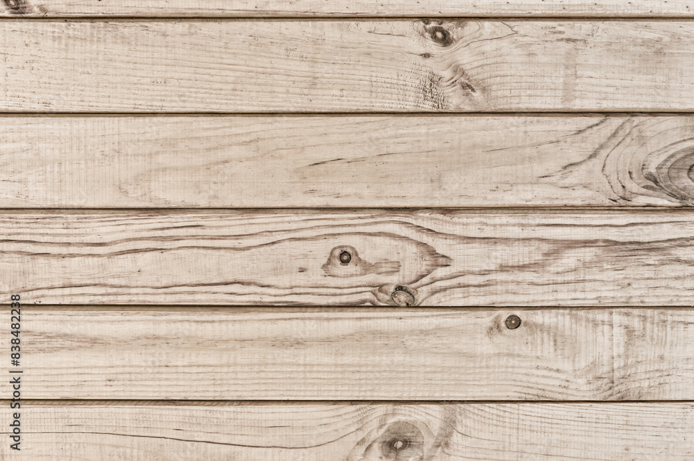 Weathered light brown wood planks background. Weathered light brown wood planks background.