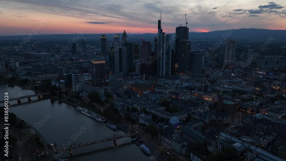Aerial hyperlapse time lapse of the financial district skyline at Frankfurt am Main, Germany, emphasizing the city skyline. Aerial hyperlapse time lapse of the financial district skyline at Frankfurt am Main, Germany, emphasizing the city skyline.
