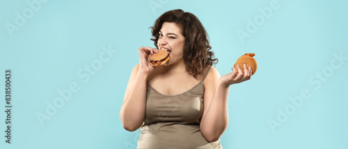Overweight woman with burge...