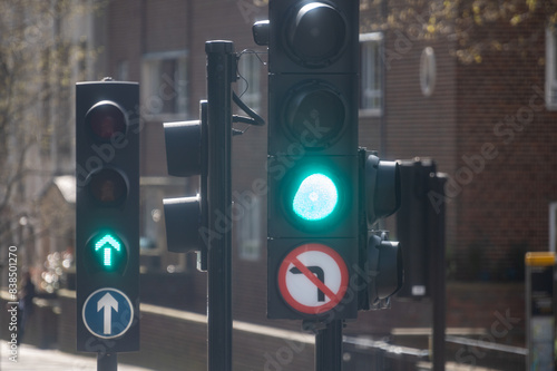 Transportation in London city, roads, road signes, street signes, warnings, indicating of directions in Great Britain, city life in England photo