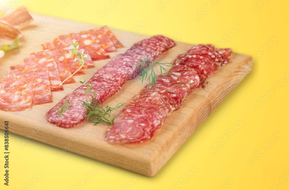 Charcuterie board with cheeses, salami, prosciutto and fresh herbs Charcuterie board with cheeses, salami, prosciutto and fresh herbs