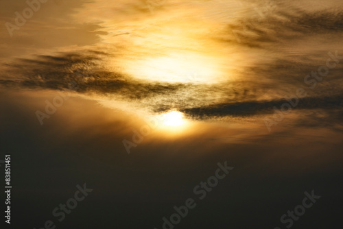 Golden Sunset Behind Clouds