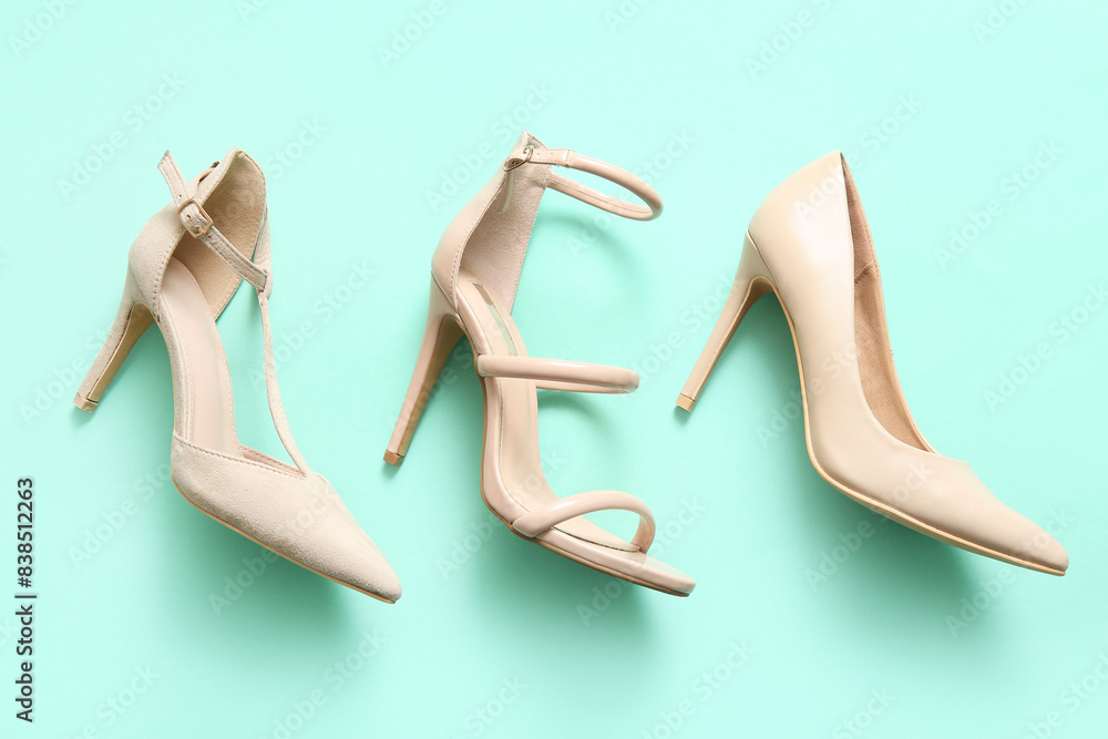 Different female shoes on color background Different female shoes on color background