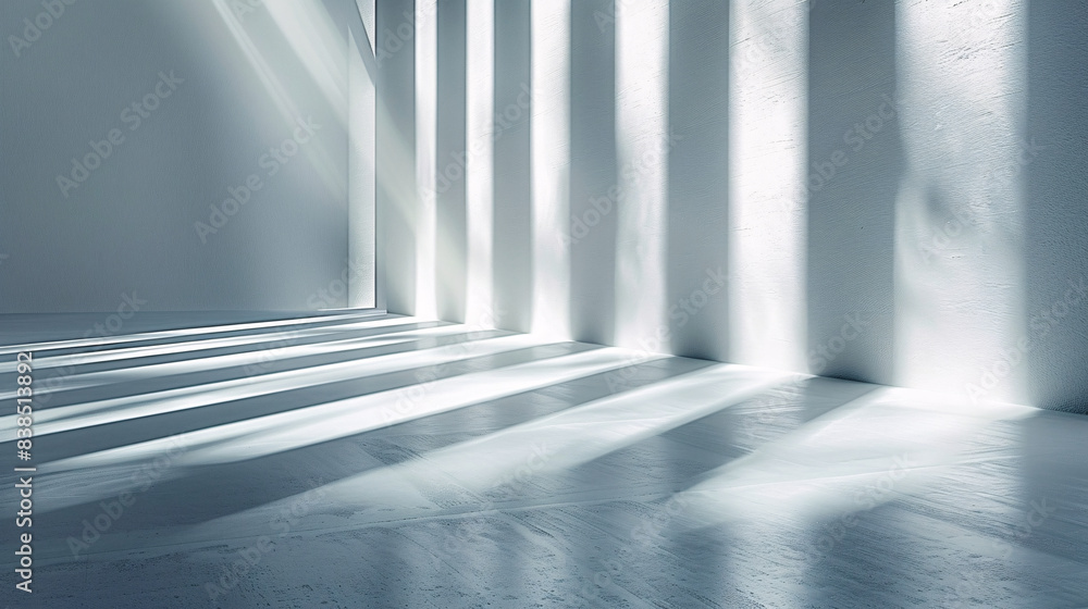 A white empty room background for product presentation with the lights and shadows of windows on the wall A white empty room background for product presentation with the lights and shadows of windows on the wall