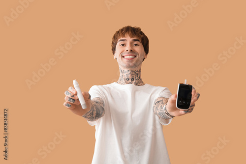 Diabetic young man with glu...