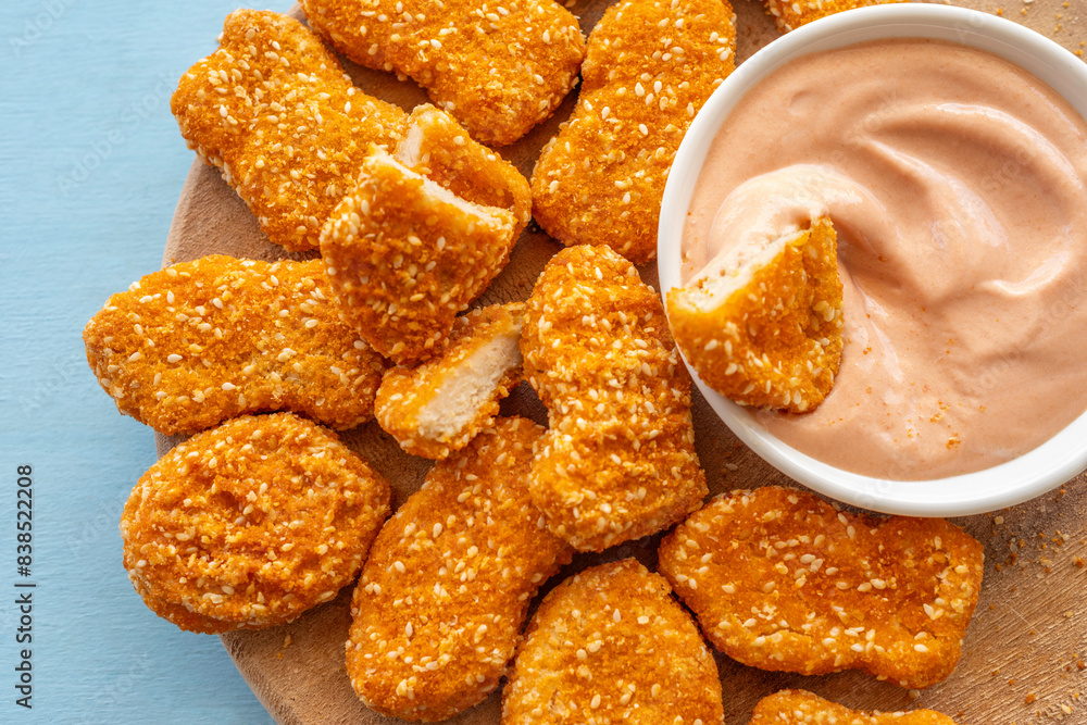 Crusty chicken nuggets and rose sauce for tasty snack. Crusty chicken nuggets and rose sauce for tasty snack.