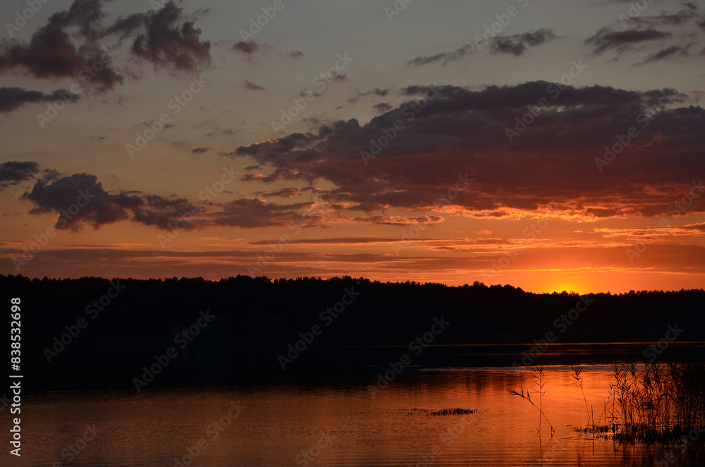summer landscape with beautiful sunset sky and calm lake summer landscape with beautiful sunset sky and calm lake