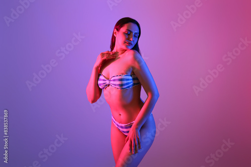 Beautiful young woman in sw...