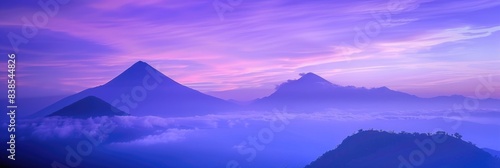 Silhouette Sunset. Purple and Blue Mountains with Mist and Fog in Quetzaltenango photo