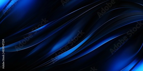Abstract background featuring dark blue silk-like waves, creating a smooth and luxurious visual effect. 