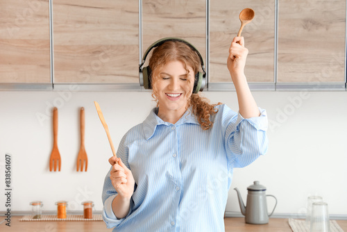 Young woman with headphones...