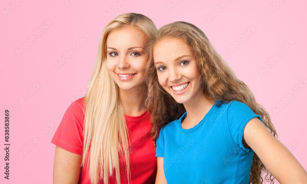 Portrait of two happy best friends hugs Portrait of two happy best friends hugs