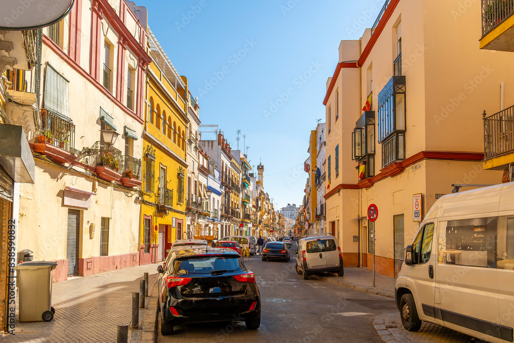 Φωτογραφία The colorful buildings along the main Calle Pureza street in the historic Triana District of the Andalusian city of Seville, Spain