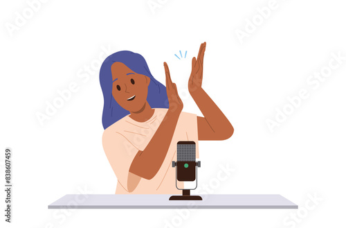 Young teenager girl actress cartoon character clapping hands voicing movie with microphone