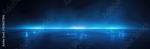 Dark blue background with illuminated floor and fog  wide angle. Abstract dark scene