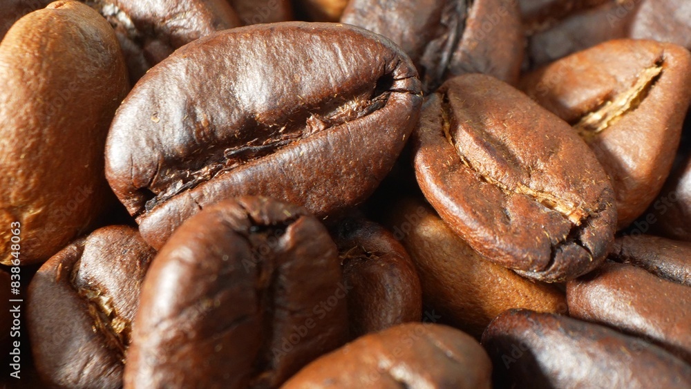 Up close, coffee beans shine with a glossy sheen, a tapestry of rich browns woven with care. The artistry of roasting unveils textures and hues, ensuring each sip bursts with robust flavor.
Up close, coffee beans shine with a glossy sheen, a tapestry of rich browns woven with care. The artistry of roasting unveils textures and hues, ensuring each sip bursts with robust flavor.