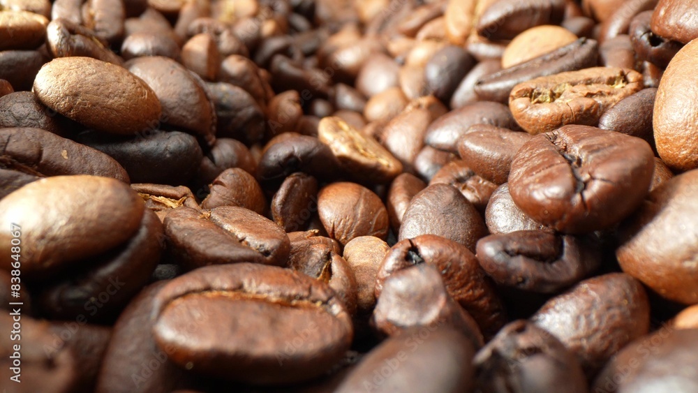 Dark as a moonless night, these coffee beans shimmer with an oily luster, hinting at their robust flavor. Textures interplay, revealing the meticulous roast that elevates each bean to perfection.
Dark as a moonless night, these coffee beans shimmer with an oily luster, hinting at their robust flavor. Textures interplay, revealing the meticulous roast that elevates each bean to perfection.