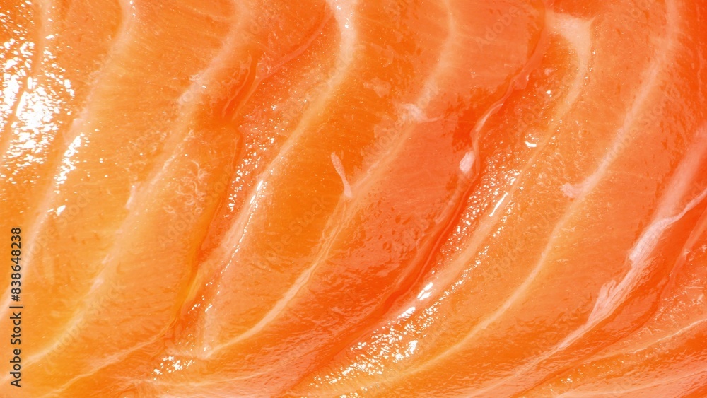 A mesmerizing close-up captures the delicate intricacies of thinly sliced salmon: vibrant orange hues of astaxanthin, intricate muscle fibers, and adipose tissue, all glistening with freshness. A mesmerizing close-up captures the delicate intricacies of thinly sliced salmon: vibrant orange hues of astaxanthin, intricate muscle fibers, and adipose tissue, all glistening with freshness.