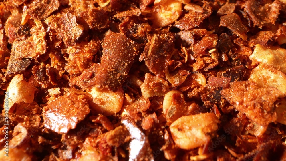 Up close, ground chili teases the eye with its fiery palette, a blend of passionate reds and robust browns. Its texture, a medley of flakes and seeds, promises a tantalizing, spicy experience.
Up close, ground chili teases the eye with its fiery palette, a blend of passionate reds and robust browns. Its texture, a medley of flakes and seeds, promises a tantalizing, spicy experience.