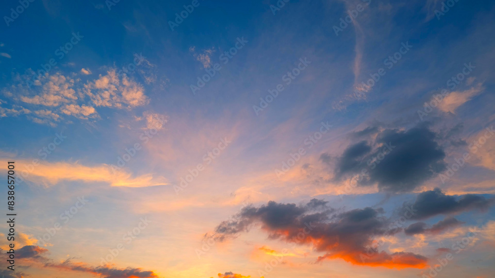 A serene sunset sky, featuring a gradient from deep blue at the top to warm orange and pink tones near the horizon. Fluffy clouds are scattered throughout, adding depth and contrast.
A serene sunset sky, featuring a gradient from deep blue at the top to warm orange and pink tones near the horizon. Fluffy clouds are scattered throughout, adding depth and contrast.