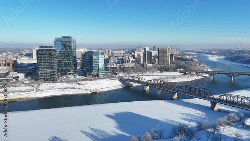 Aerial Drone Footage of Downtown Saskatoon in Winter - Snowy Streets, City Skyline, and Urban Beauty
