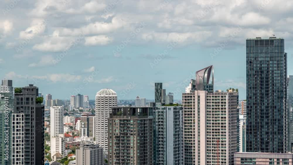 Timelapse video showing clouds and shadows and the skyline of the Thong Lo district in downtown Bangkok