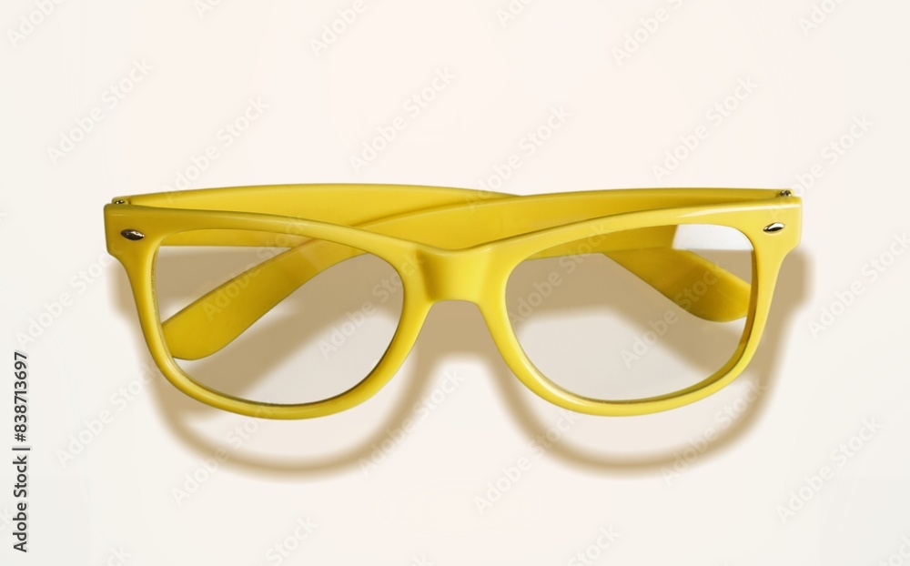 Fototapeta premium Stylish modern yellow sunglasses in fashion frame