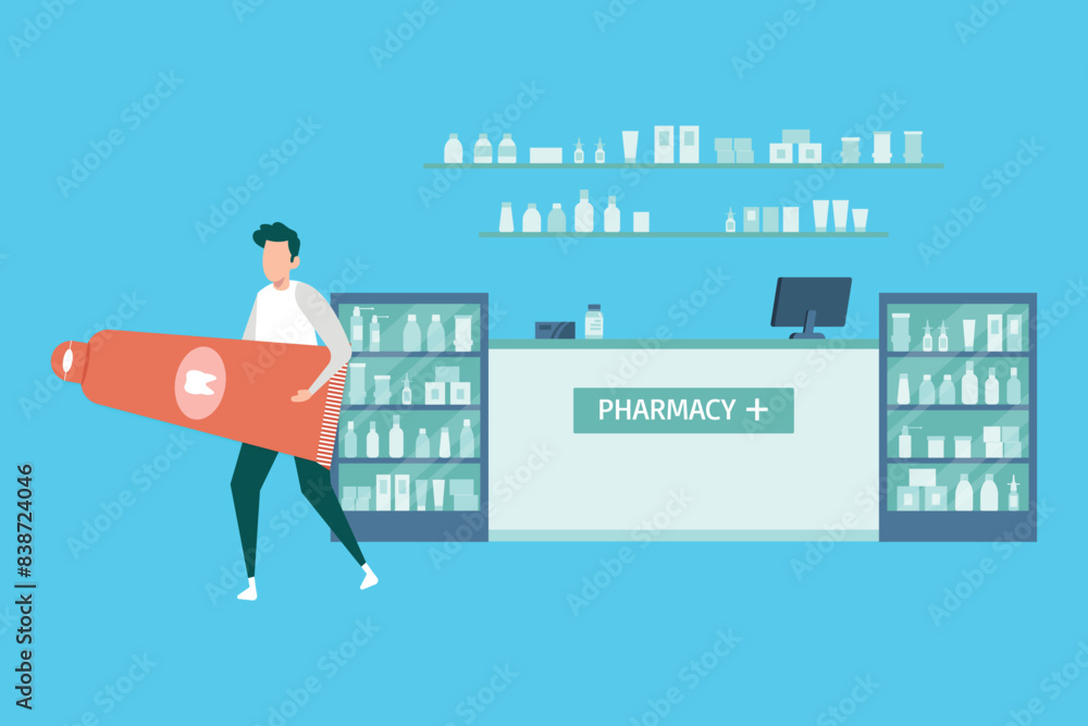 A boy is holding toothpaste in a pharmacy. A boy is holding toothpaste in a pharmacy.