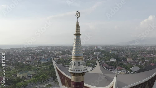 Establish aerial view of Grand Mosque, one of the largest mosques in Indonesia, is located in the city of Padang, West Sumatra .d-log raw stock video photo